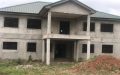 TITLED & ROOFED 8BRM STOREY HOUSE ON ALMOST 2 & HALF PLOTS @ HAATSO